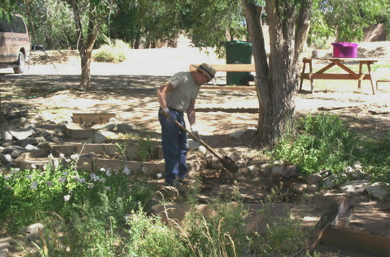 Paul Hoffman Digging Hole for Bench