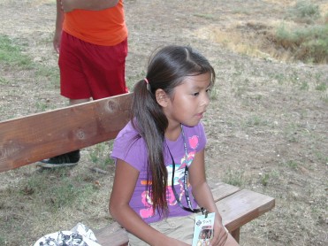 Child Taking a Break After Playing Tag