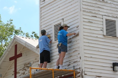 Wichita, Kansas Church Workers Scraping Paint