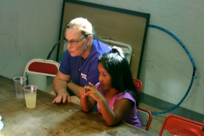 Becky with Girl in Classroom