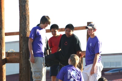 Youth with Children on Playground