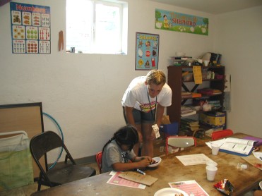 CAitlyn Helping Ute Child