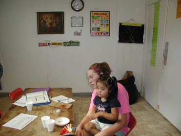 Sarah Helping Ute Child