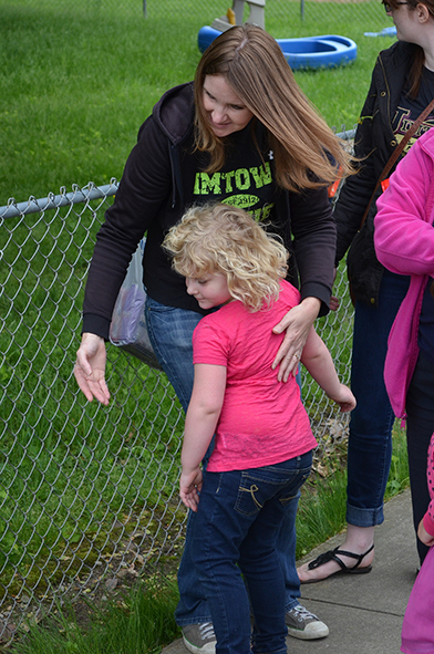 Corina Hugging Child