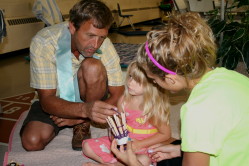 Teaching Child to Weave Basket