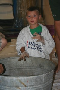 Child Making a Brick