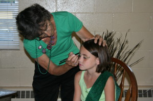 Getting Her Eyes Painted