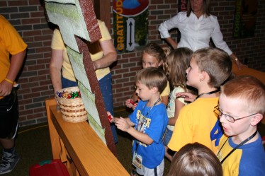 Children Placing Bows on the Cross