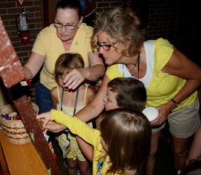 Children Placing Bows on the Cross