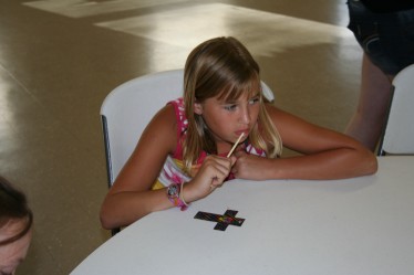 Girl Decorating Cross