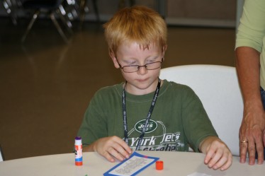 Boy Making Bookmark