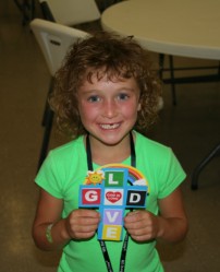 Girl Showing Cross