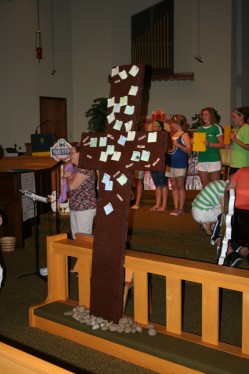 Cross with Notes & Rocks at the Foot