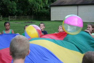 Children Holding Parachute