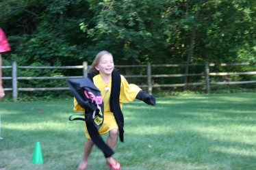 Girl Running with Bag Clothing Articles