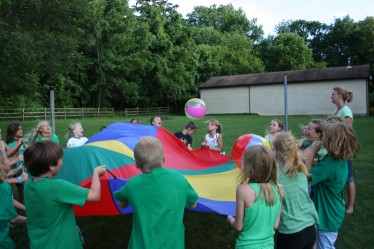 Children Holding Parachute