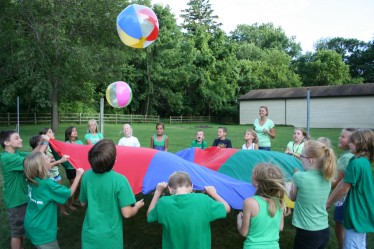 Children Holding Parachute
