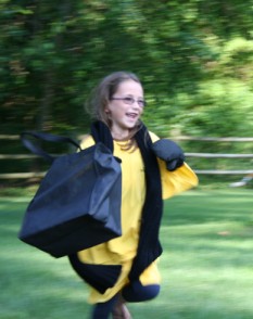 Girl Running with Bag and Clothing Articles