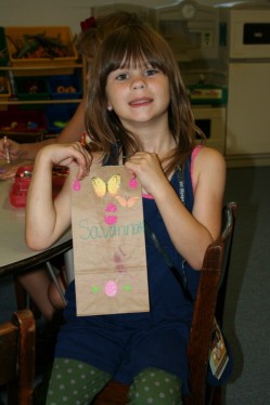 Girl with Decorated Sack