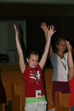 Youth & Girl Singing with Arms RAised