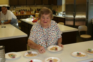 Geneva Cook Prepares Snacks