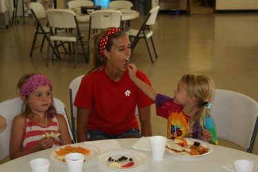 Joy Gets Help with Snack