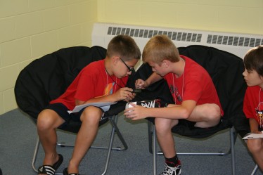 Children Experimenting with a Compass