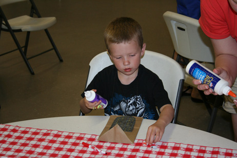 Child Making "Popcorn Pal" Bag