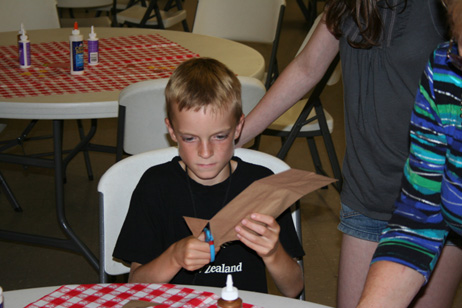 Child Making "Popcorn Pal" Bag