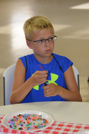 Boy Working on Bookmark