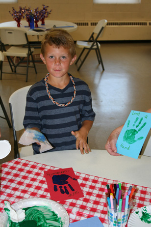 Boy with His Handprint