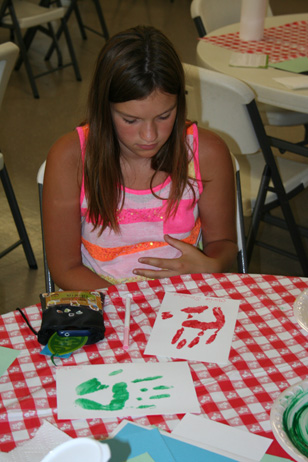 Girl with Finished Handprints