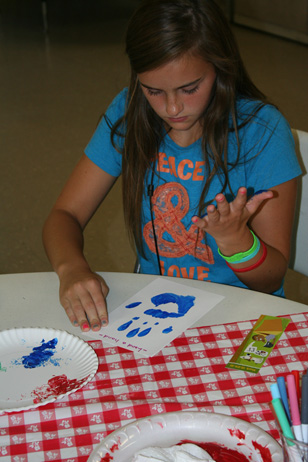 Girl Checking Out Her Handprint