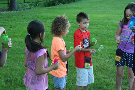 Children Passing Soap Bubbles