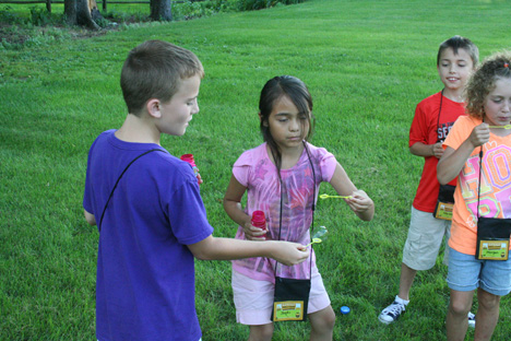 Children Passing Soap Bubbles