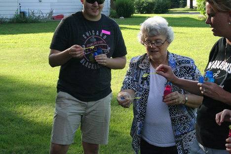 Volunteers Passing Soap Bubbles