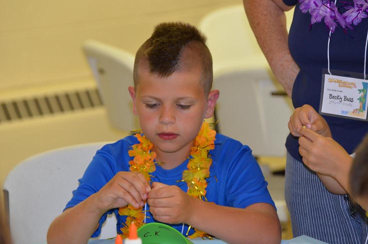 Boy Decorating Sun Visor