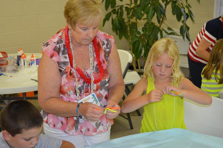 Roberta Helping Girl with Dragon Fly