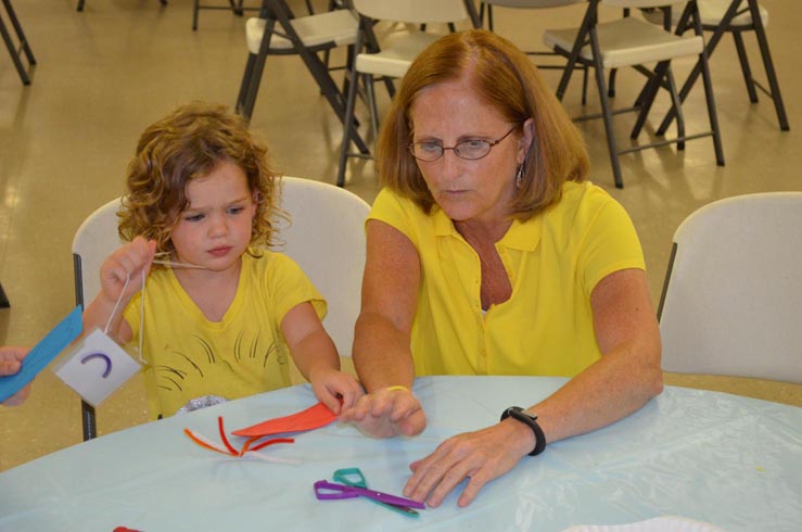 Rita Helping Girl with Dragon Fly