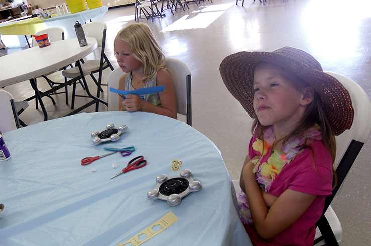 Girl Admiring Her Starfish Craft