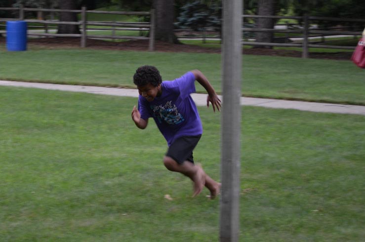 Boy Running to Find Shell Clues
