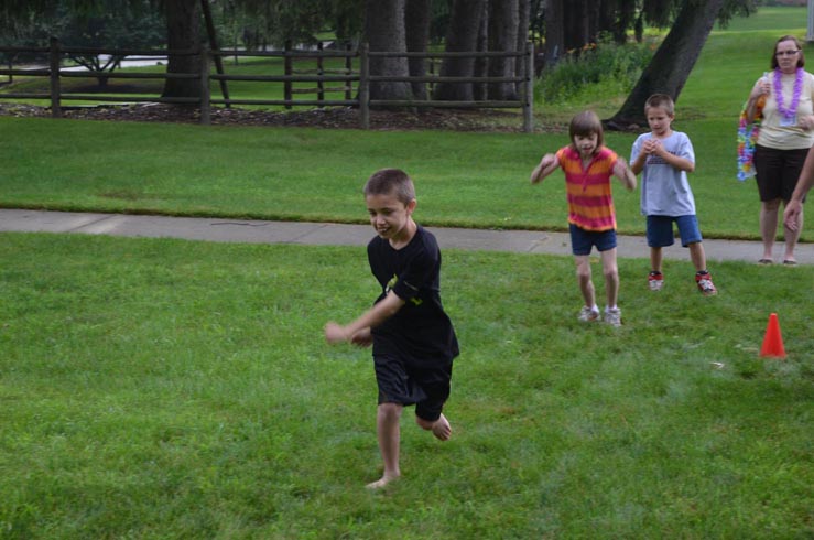 Boy Running to Find Shell Clues