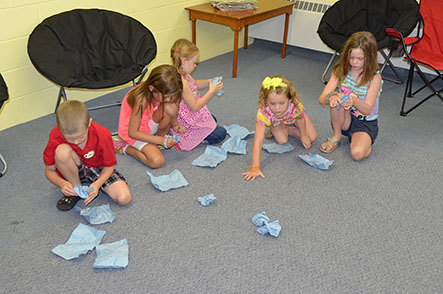 Child Crumpling up Paper