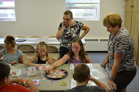 Becky, Roberta, Deb & Lisa Watching Children Make Hearts