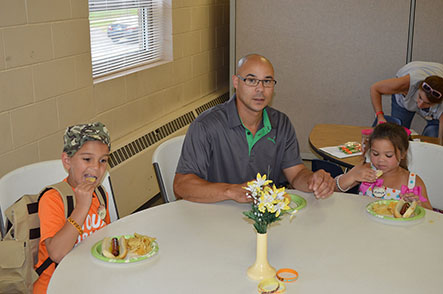 Children Eating with Family