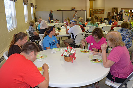 Families & Volunteers Eating