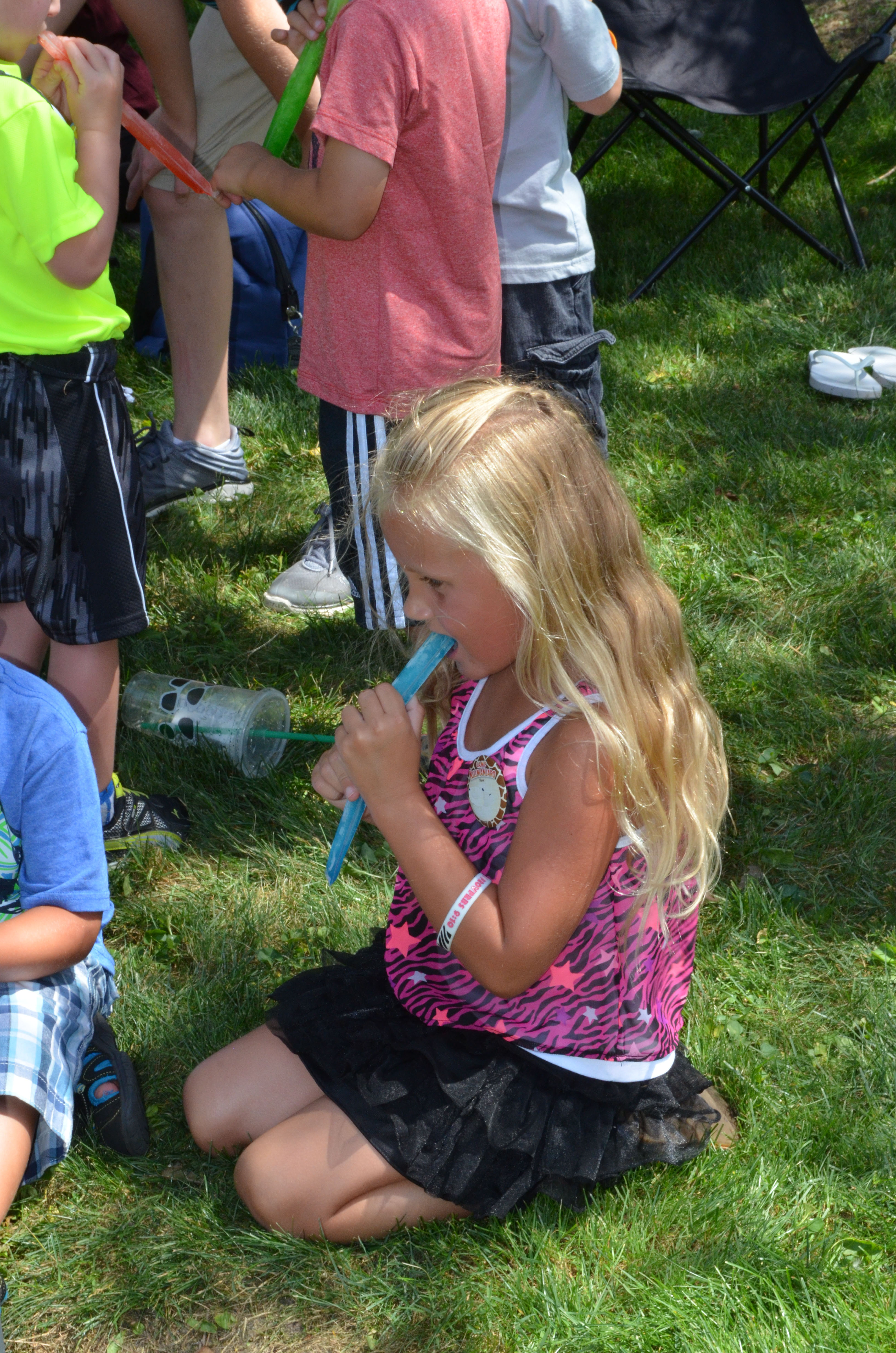 Children Eating Frozen Icicles