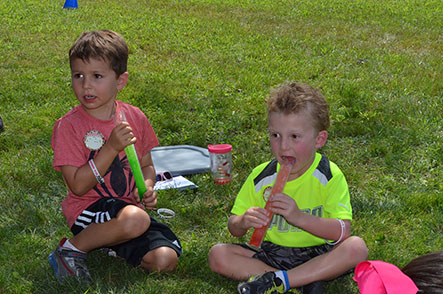 Children Eating Frozen Icicles