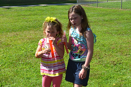 Children Eating Frozen Icicles