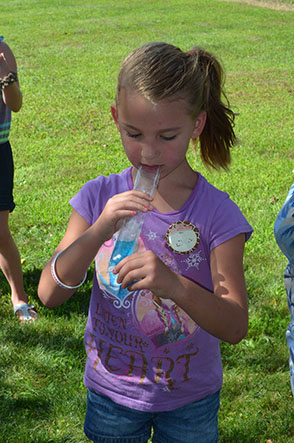 Children Eating Frozen Icicles